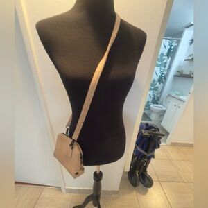 Compact Beige Crossbody Bag with Adjustable Strap
